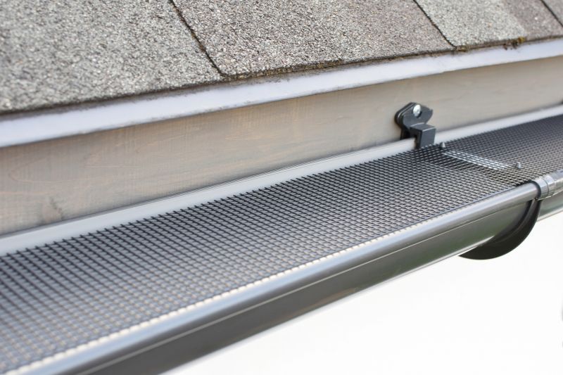 Gutter system with protective cover